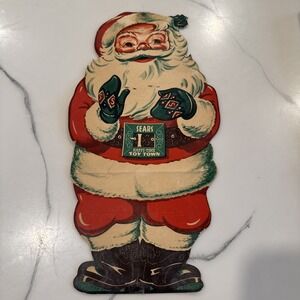 Sears 1948 Christmas Mechanical Winking Santa Claus Happi-Time Toy Town Die Cut